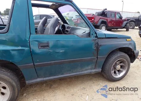 1998 Chevrolet Tracker Base Cmi из США, поврежденный, VIN 2CNBE1865W6925992